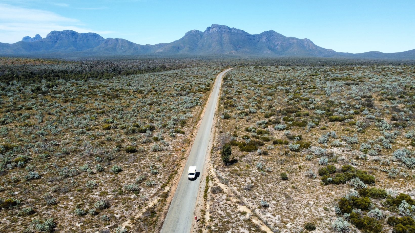 hire camper on road with Stirling Ranges in the background